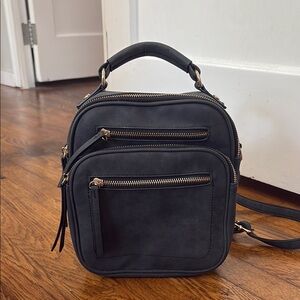 Chic Black Backpack with Gold Accents